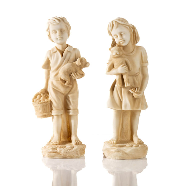 Traditional child statues positioned near an entrance