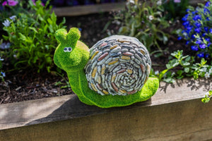 Stone and grass effect snail garden ornament