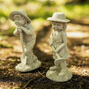 Gardening kids statues displayed together outdoors