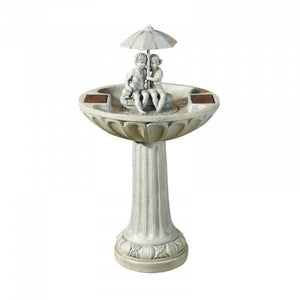 Stone effect solar water fountain displayed outdoors