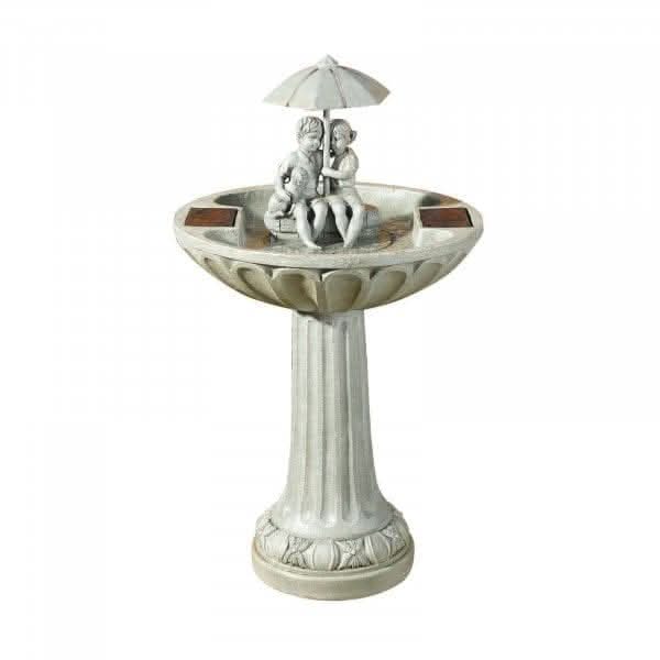 Stone effect solar water fountain displayed outdoors