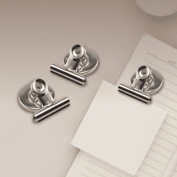 Silver magnetic clips displayed together