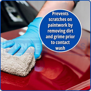 Person cleaning a car's red surface with a blue glove and text about preventing scratches.