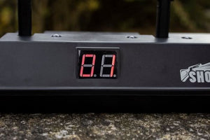 Electronic shooting game displaying flashing target lights