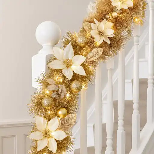 Decorative garland with gold and white flowers on a staircase