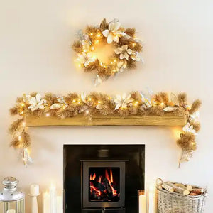 Decorated fireplace mantel with garland, wreath, and candles