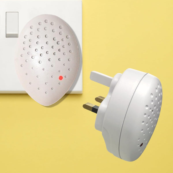 Ultrasonic pest repeller plugged into indoor wall socket