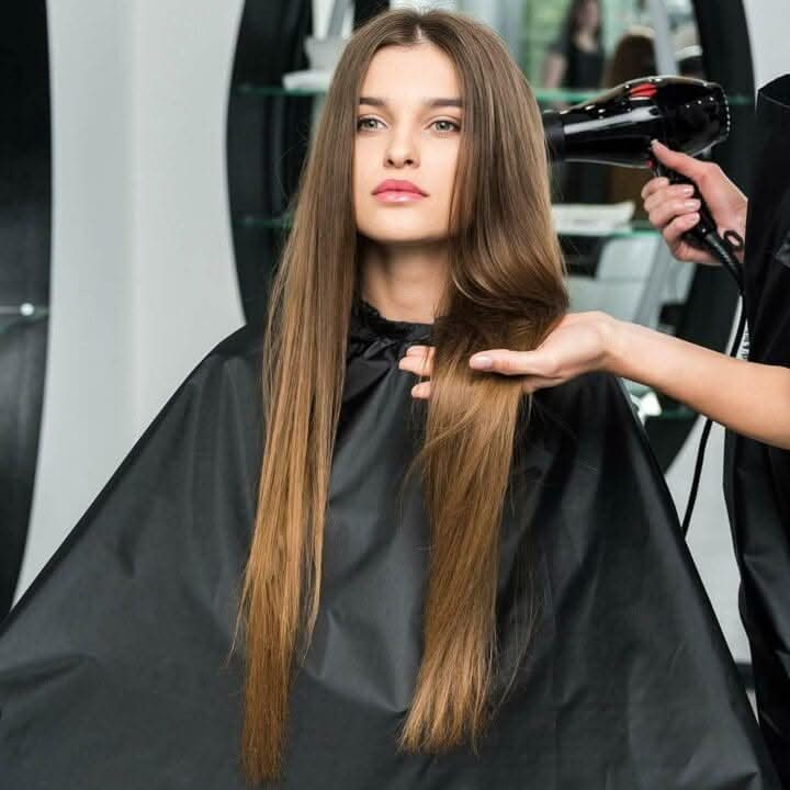 Black hairdressing cape for adult salon and barber use