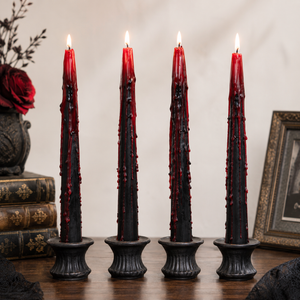 Four vampire blood effect taper candles for Halloween