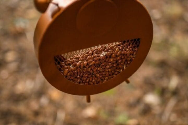 Hanging copper bird feeder for patio garden