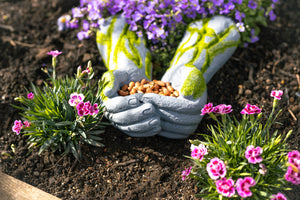 Giving open hands wall mounted bird feeder
