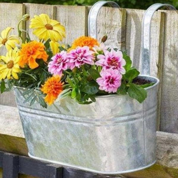 Outdoor galvanised flower planter with drainage hole