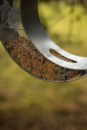 Decorative wild bird feeder displayed outdoors