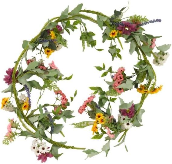 Faux flower garland displayed on garden archway structure