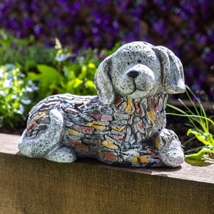 Weatherproof resin dog ornament shown outdoors