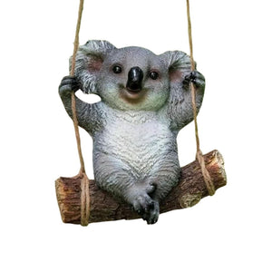 Resin koala with securely attached rope cord