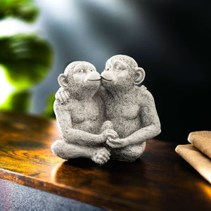 Weatherproof monkey ornament displayed in a garden