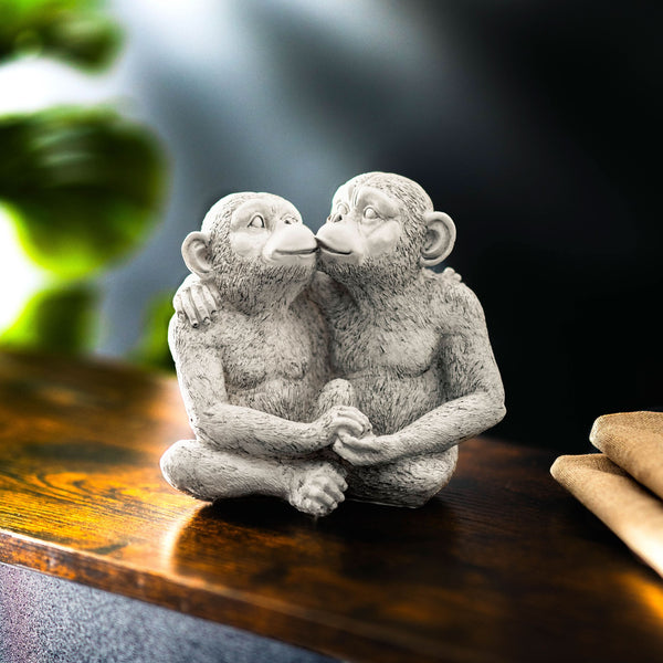 Weatherproof monkey ornament displayed in a garden