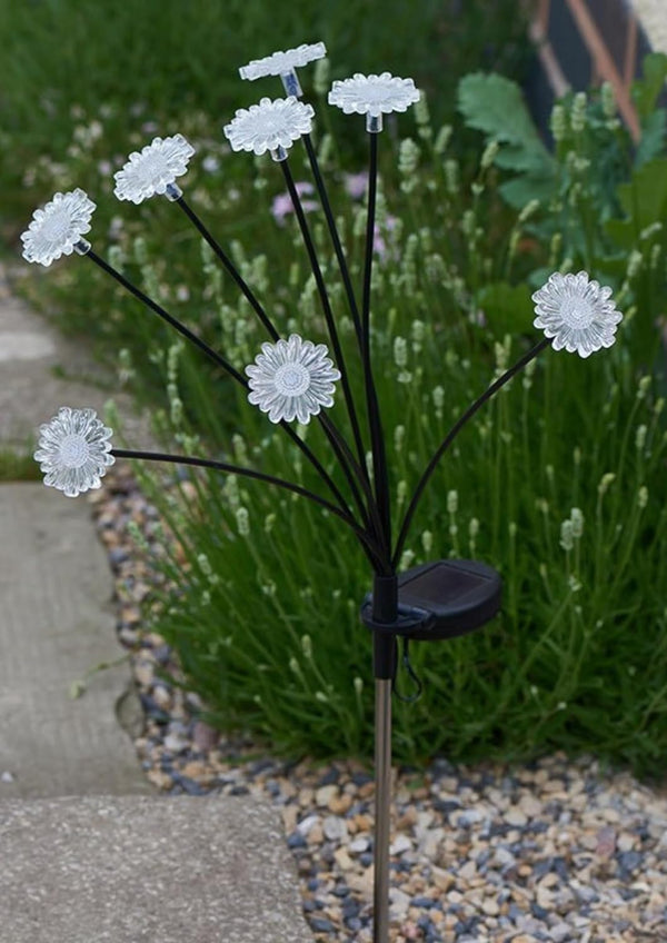 solar pathway lights with daisy flowers