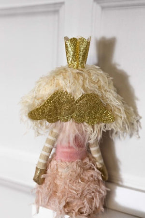 Soft-touch winter fairy decoration shown close up