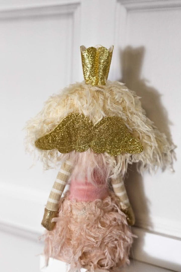 Soft-touch winter fairy decoration shown close up