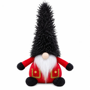 A Christmas gnome figurine with a tall black shaggy hat, red outfit, white beard, and black feet, centered on a plain white background.