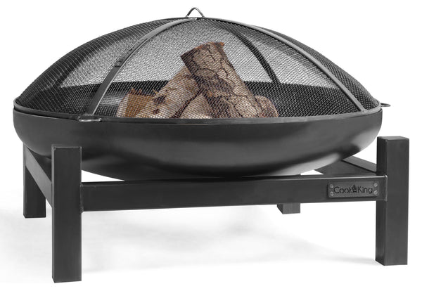 Black fire pit with mesh screen and logs on a white background