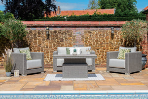 Outdoor lounge set with adjustable table