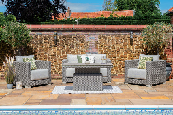 Outdoor lounge set with adjustable table