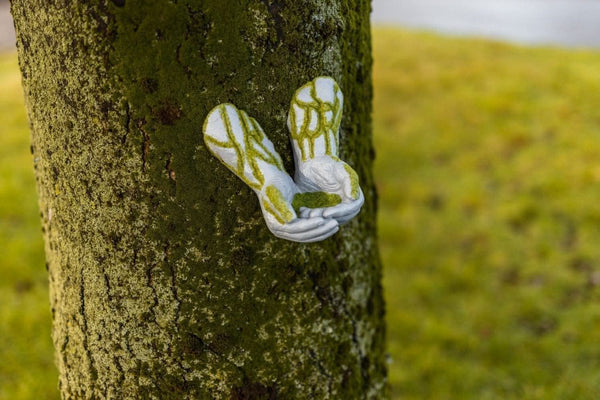 Tree mounted bird feeder sculpture