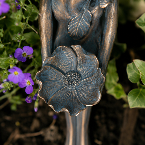 30cm fairy statue displayed amongst garden plants