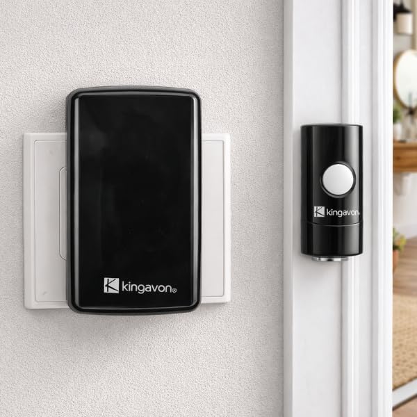 Black wireless digital door chime receiver.