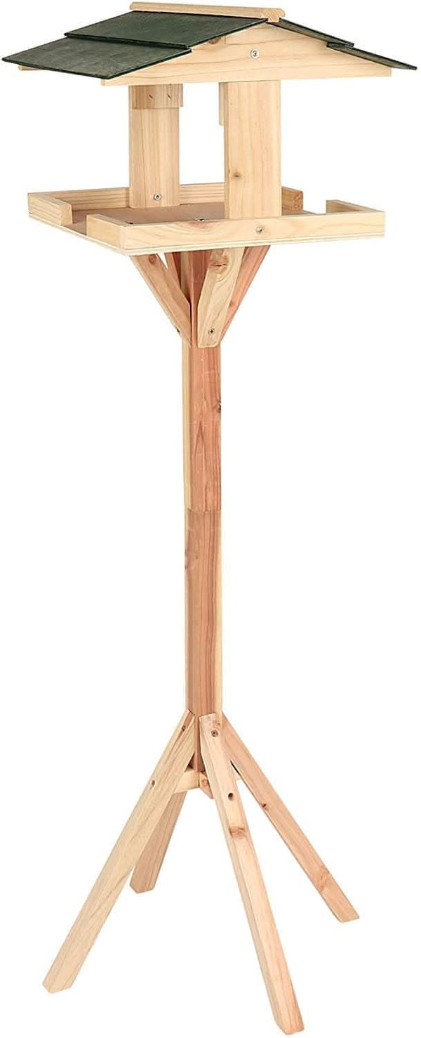 Traditional garden bird feeder made from wooden pieces
