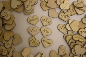 Small rustic hearts for wedding table decoration