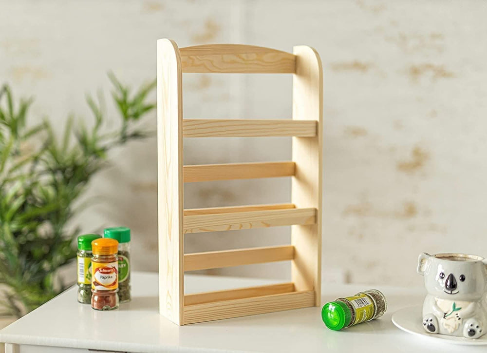 Three tier wooden spice rack on kitchen counter