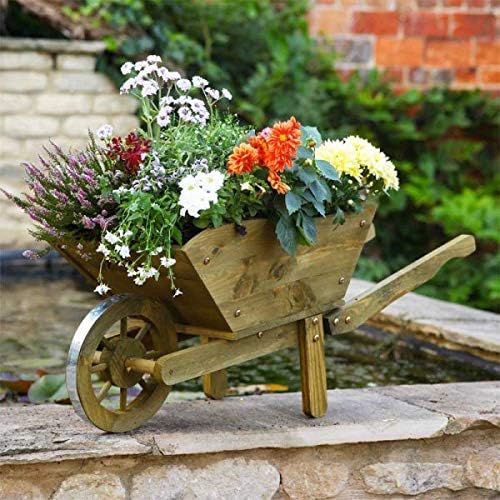 Rustic wooden wheelbarrow garden planter