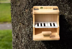 Hanging wooden bird feeder for small wild birds
