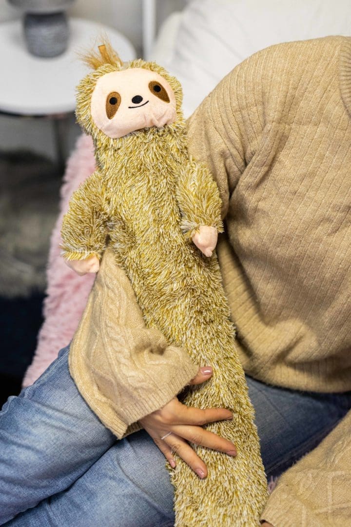 long-hot-water-bottle-with-removable-sloth-cover