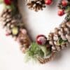 heart-shaped-wreath-decor-pinecones-and-faux-leaves