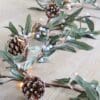 garland-christmas-decor-mistletoe-pinecones-berries