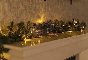 christmas-garland-with-lights-pine-cone-and-berries